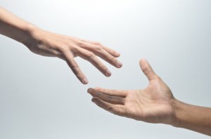 reaching hands